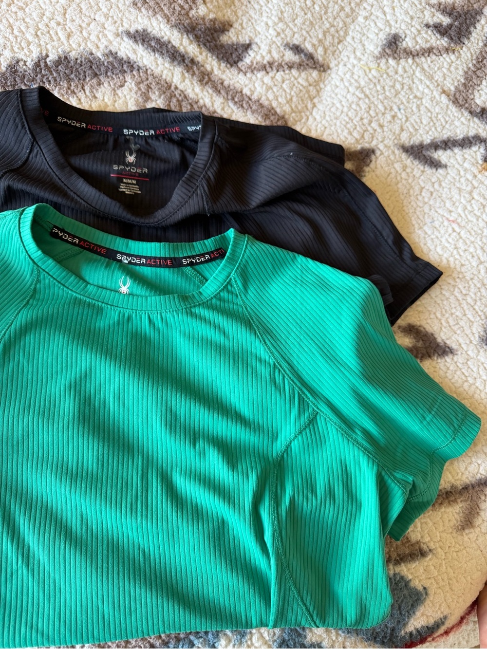 Spyder Short Sleeve Active Tees in Black and Teal